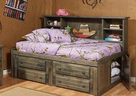 Twin bed with dresser underneath top